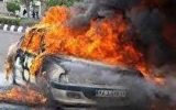 نجات راننده گرفتار در آتش با شجاعت مامور پلیس